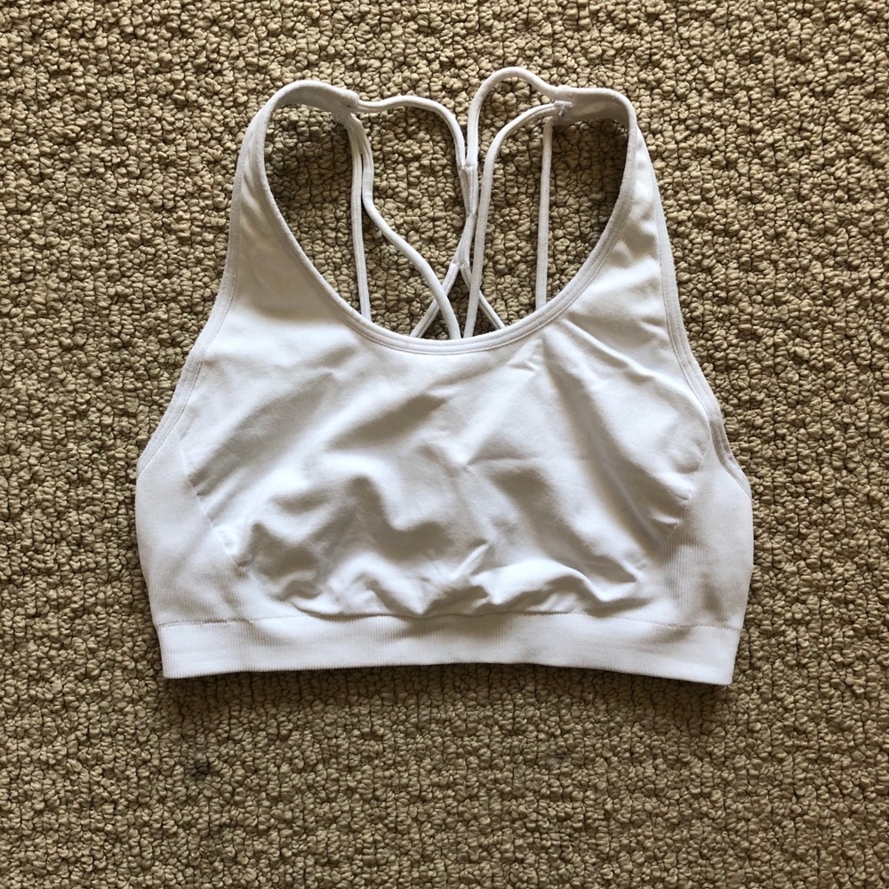 White fabletics sports bra.